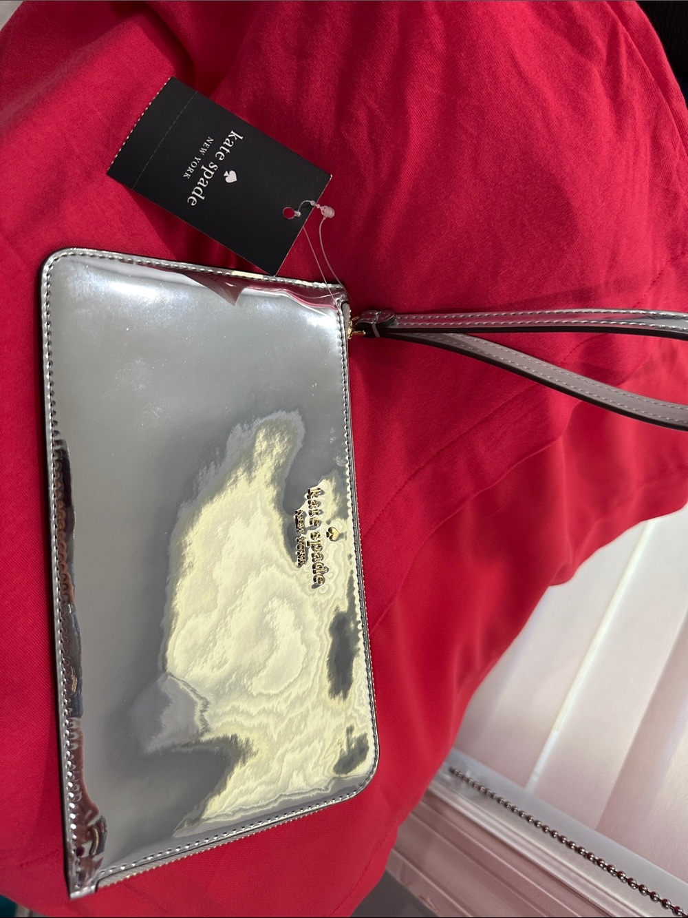 kate spade Silver Patent Wristlet with Strap